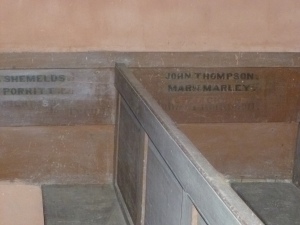 The painted names at Skelton Old Church - if you look carefully you can see the ones that have been painted over!
